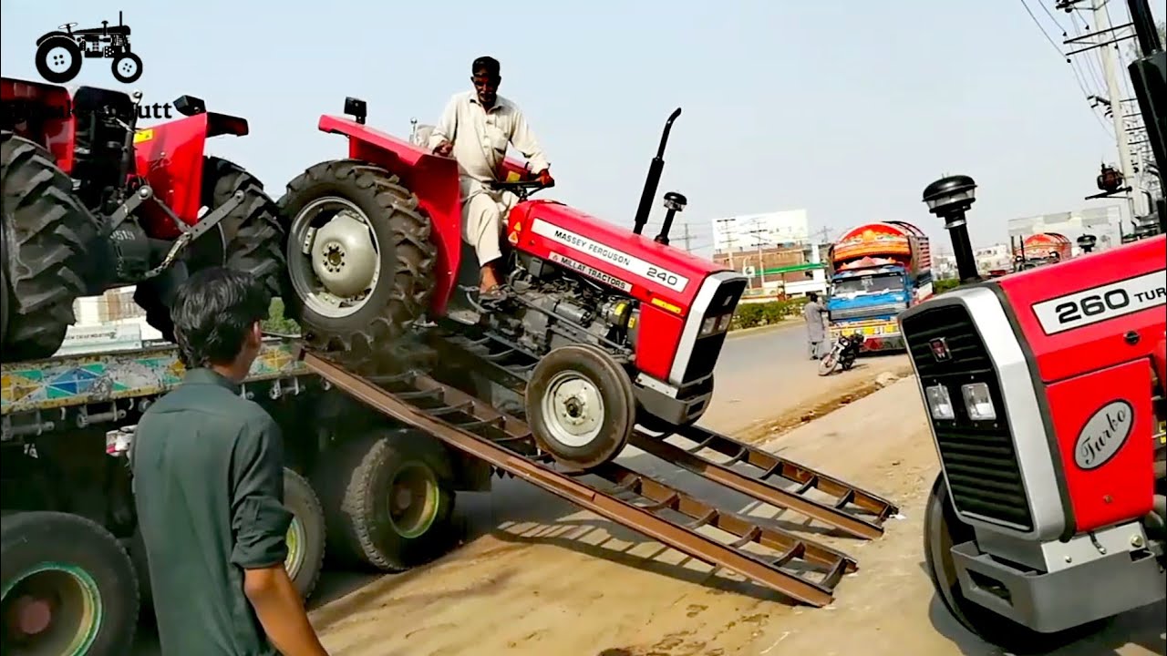 Talented Driver Loaded The New Massey Ferguson Tractors On Trailer In Millat Tractor Company